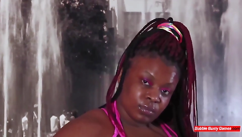 Ebony girl with tattooed red head dress fucked in doggy