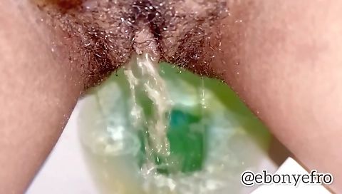 Ebony babe with a sexy ass and a shaved pussy jerks off