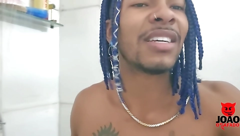 Creampied girl with a tattoo on her body in a fetish scene