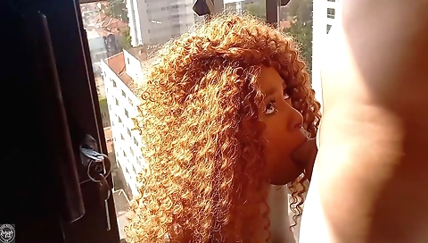 Blonde in red dress and black stockings is making out