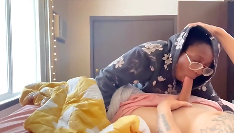 Brunette milf is having fun with the black man in the park