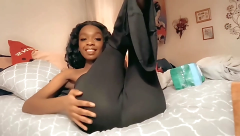 Ebony girl with a hairy pussy enjoys her hairy body