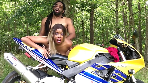 Ebony big ass brunette naked outside in a public spot