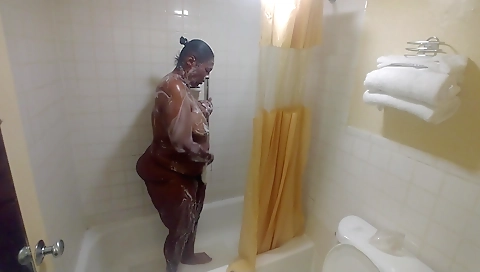 Blonde & ebony milf in the shower is doing perfect solo