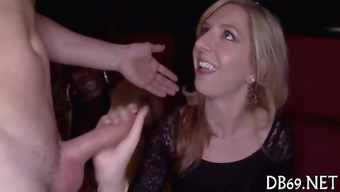 Busty brunette fucks her blonde friend in a group sex video