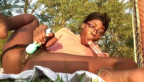 Ebony milf masturbating in her favorite outdoor setting