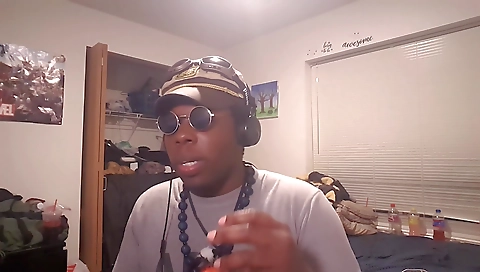 Ebony babe in a white dress and black top riding cock