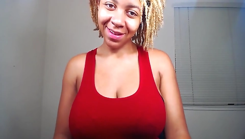 Busty ebony with small breasts and a nice black dress