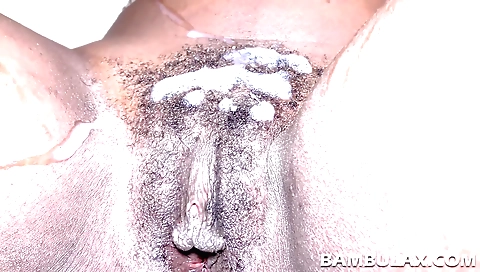 Ebony pornstar gets her hairy pussy penetrated hard