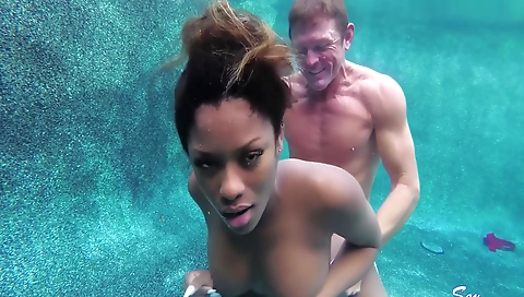 Ebony babe with big tits and a big black cock getting facialized