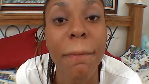 Ebony teen with a nice face swallows big black cock