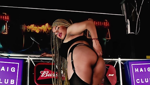 Beautiful brunette with large boobs shows off a hot body