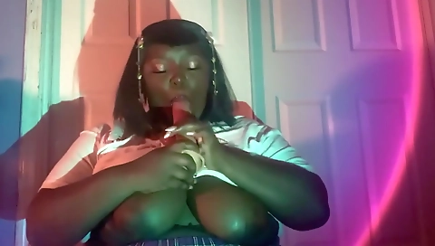 Scorching ebony chick with a big ass wears a sexy bikini body pillow