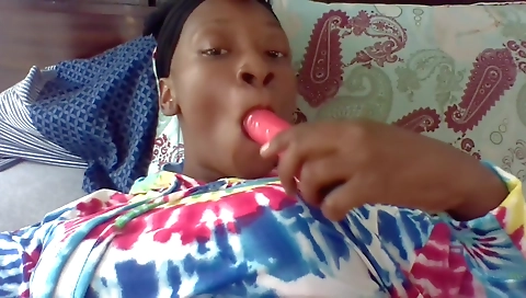 Busty teen is getting nappy while using a big black toy